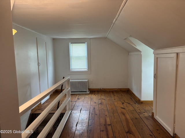 1922 Regent St, Niskayuna, NY 12309 - additional living space with radiator, wood-type flooring, and vaulted ceiling
