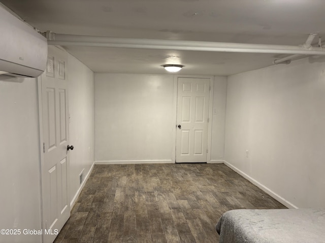 1922 Regent St, Niskayuna, NY 12309 - finished basement with wood finished floors and a wall unit AC