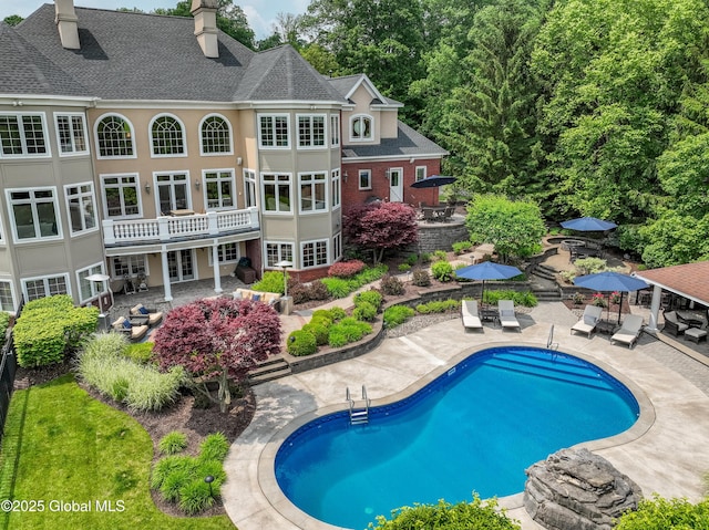 1 Stoneridge Dr, Colonie, NY 12211 - swimming pool featuring a patio area and a wooden deck
