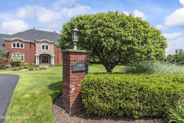 1 Stoneridge Dr, Colonie, NY 12211 - view of front facade featuring a front lawn and stone siding