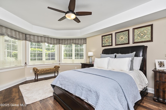 1 Stoneridge Dr, Colonie, NY 12211 - bedroom featuring dark wood-type flooring, a raised ceiling, and ceiling fan