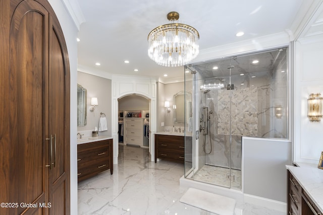 1 Stoneridge Dr, Colonie, NY 12211 - bathroom with marble tiled flooring, ornamental molding, a marble finish shower, two vanities, and recessed lighting