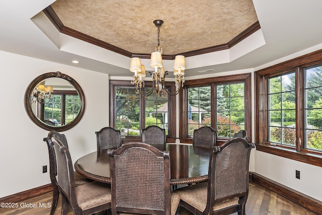1 Stoneridge Dr, Colonie, NY 12211 - dining area featuring a chandelier, a raised ceiling, crown molding, wood finished floors, and recessed lighting