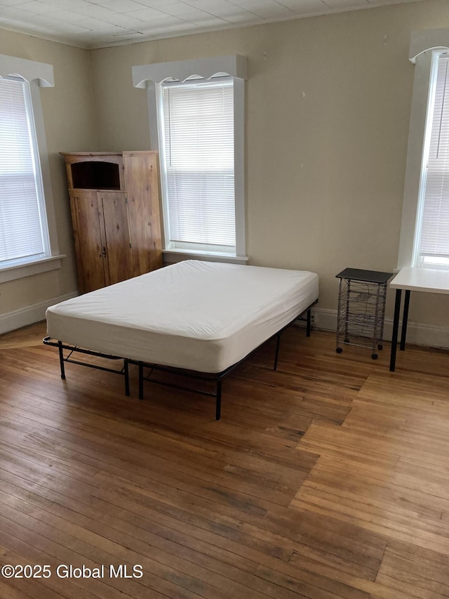 45 14th St, Troy, NY 12180 - bedroom with hardwood / wood-style floors and baseboards