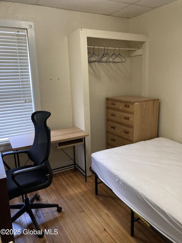 45 14th St, Troy, NY 12180 - bedroom with wood finished floors and an office area