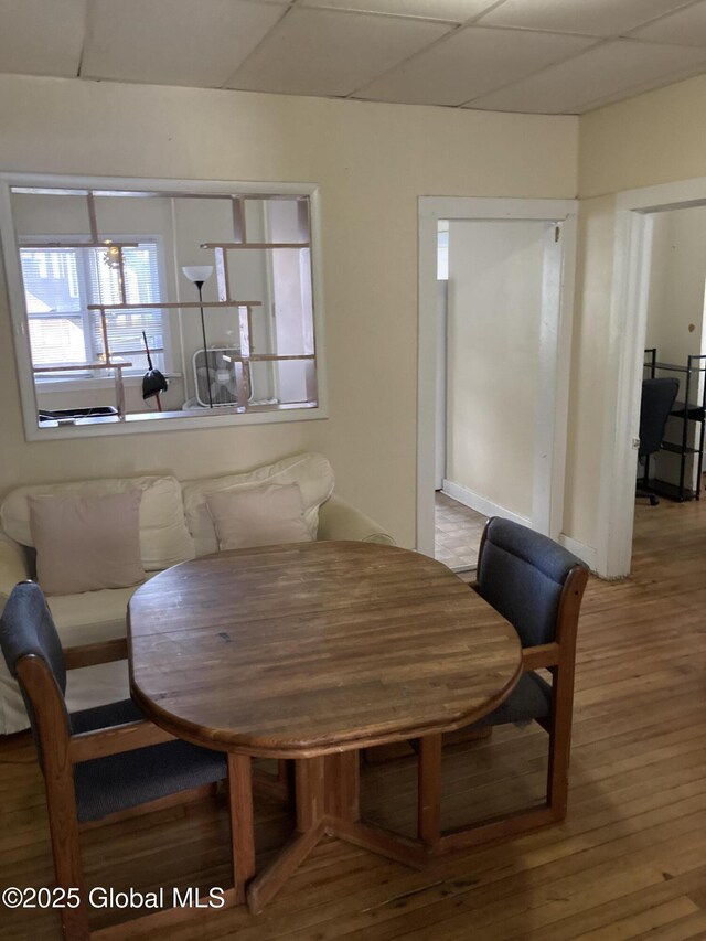 45 14th St, Troy, NY 12180 - dining area featuring wood finished floors and a paneled ceiling