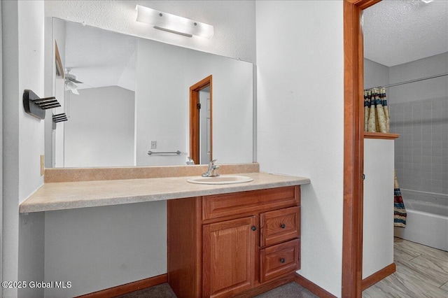 35 Justine Ct, East Greenbush, NY 12144 - bathroom with vanity, shower / tub combo with curtain, and a textured ceiling