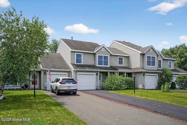 35 Justine Ct, East Greenbush, NY 12144 - view of front of home featuring driveway and a front lawn