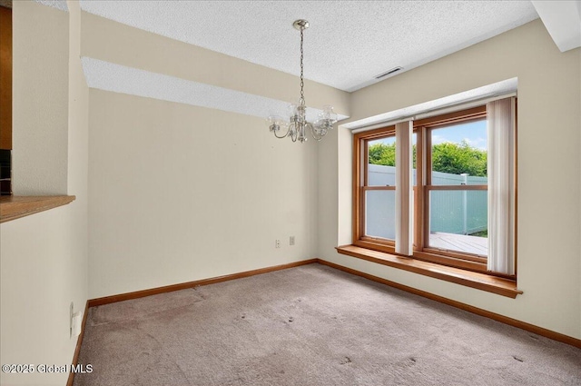 35 Justine Ct, East Greenbush, NY 12144 - spare room with carpet flooring, a chandelier, and a textured ceiling