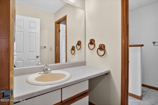 35 Justine Ct, East Greenbush, NY 12144 - bathroom with vanity and a textured ceiling