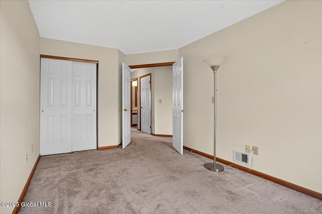 35 Justine Ct, East Greenbush, NY 12144 - unfurnished bedroom with carpet flooring and a closet
