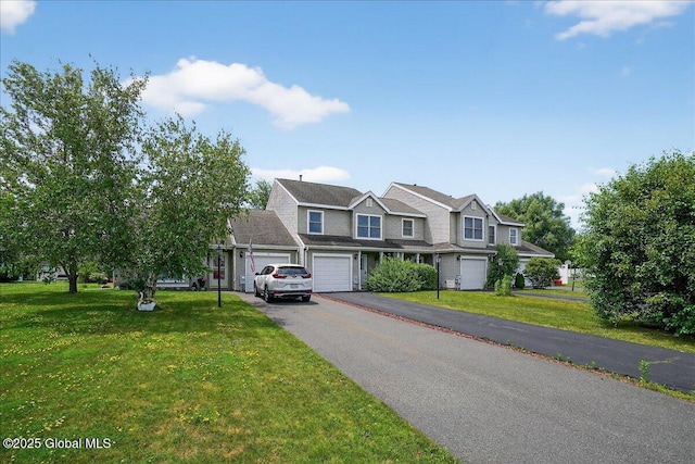 35 Justine Ct, East Greenbush, NY 12144 - view of front of home with driveway, a front lawn, and a garage