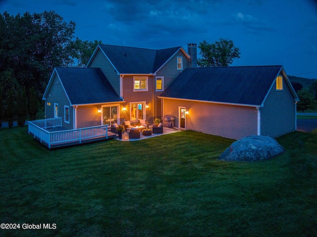 363 Goodman Rd, Fort Ann, NY 12827 - back of property with a chimney, an outdoor living space, a yard, and a deck