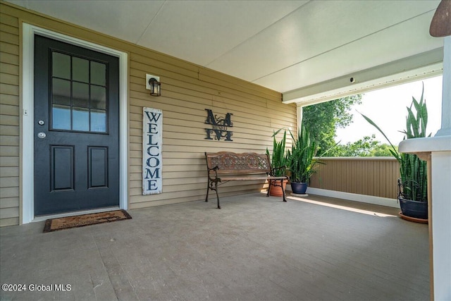 363 Goodman Rd, Fort Ann, NY 12827 - doorway to property featuring a porch