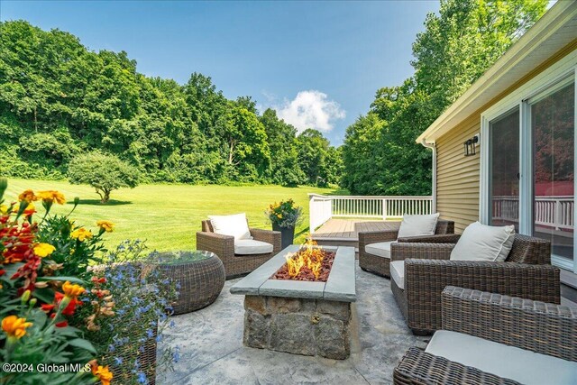 363 Goodman Rd, Fort Ann, NY 12827 - view of patio featuring an outdoor fire pit and a deck