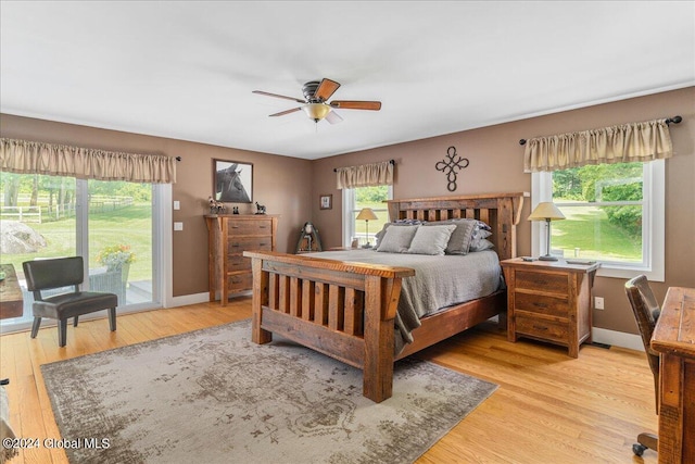 363 Goodman Rd, Fort Ann, NY 12827 - bedroom featuring access to outside, light wood-style floors, baseboards, and a ceiling fan