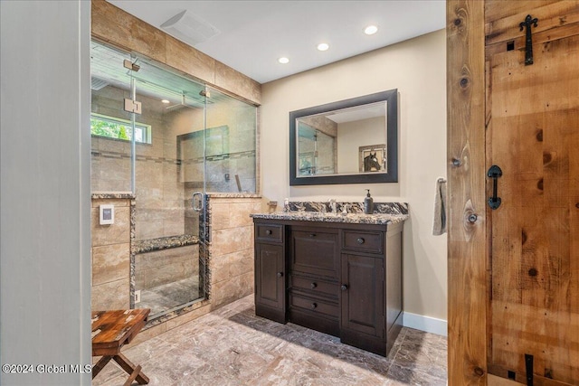 363 Goodman Rd, Fort Ann, NY 12827 - bathroom with vanity, a shower stall, recessed lighting, baseboards, and marble finish floors