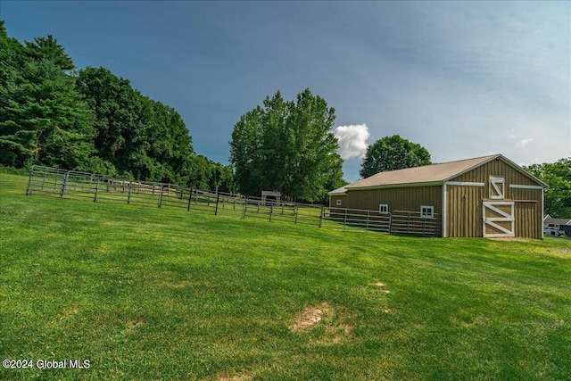 363 Goodman Rd, Fort Ann, NY 12827 - view of green lawn with an exterior structure, an outdoor structure, and an outbuilding