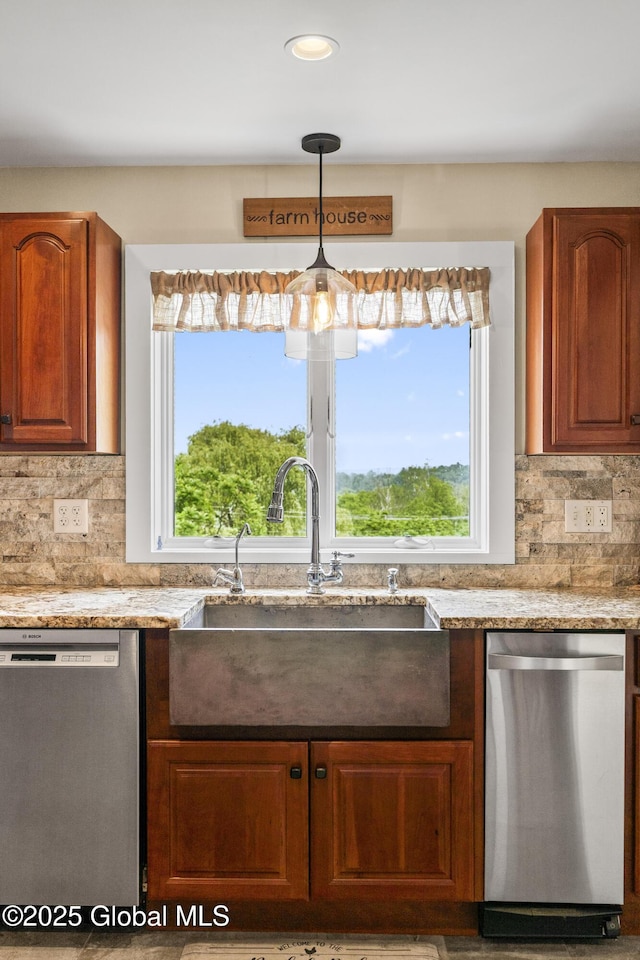363 Goodman Rd, Fort Ann, NY 12827 - kitchen with stainless steel dishwasher, a sink, light stone counters, decorative backsplash, and recessed lighting
