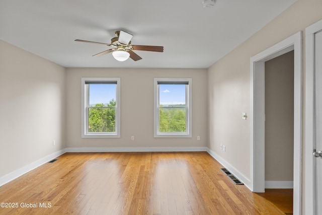 363 Goodman Rd, Fort Ann, NY 12827 - spare room with light wood-style floors, baseboards, ceiling fan, and a smoke detector