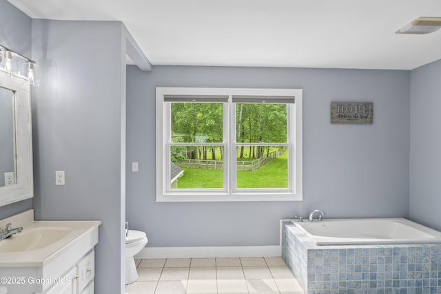 363 Goodman Rd, Fort Ann, NY 12827 - full bathroom featuring vanity, tile patterned flooring, tiled tub, toilet, and baseboards