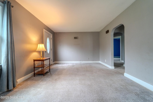1298 Mcclellan St, Schenectady, NY 12309 - carpeted spare room with arched walkways and baseboards
