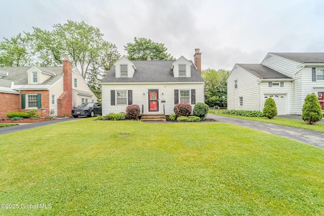 1298 Mcclellan St, Schenectady, NY 12309 - cape cod house featuring a chimney, a front yard, and asphalt driveway