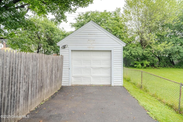 1298 Mcclellan St, Schenectady, NY 12309 - detached garage featuring driveway