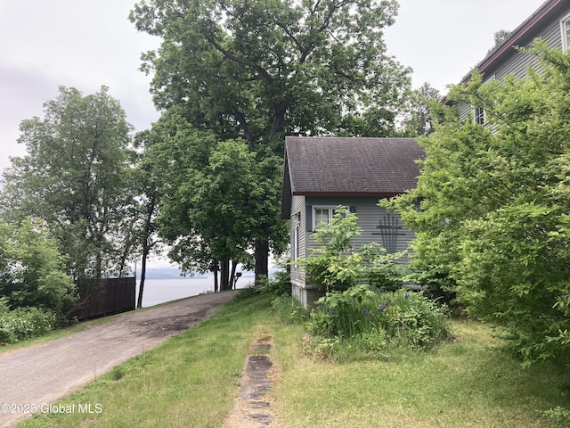 48 Spring St, Port Henry, NY 12974 - view of front of house with a water view and a shingled roof