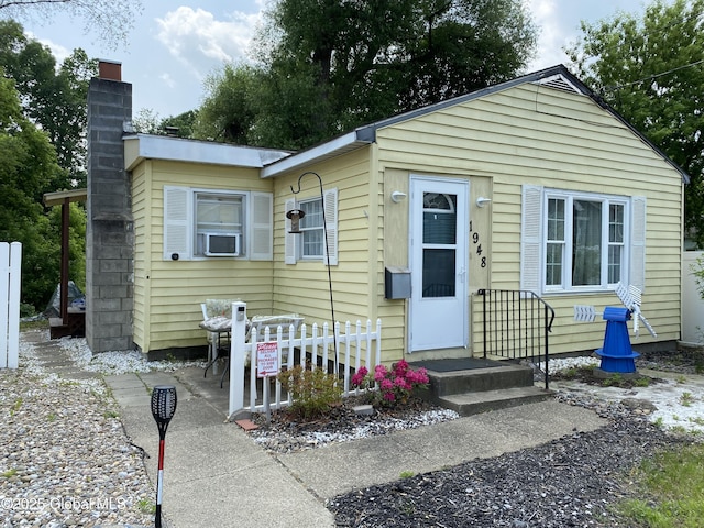 1948 Leo Ave, Rotterdam, NY 12306 - view of front of home featuring a chimney