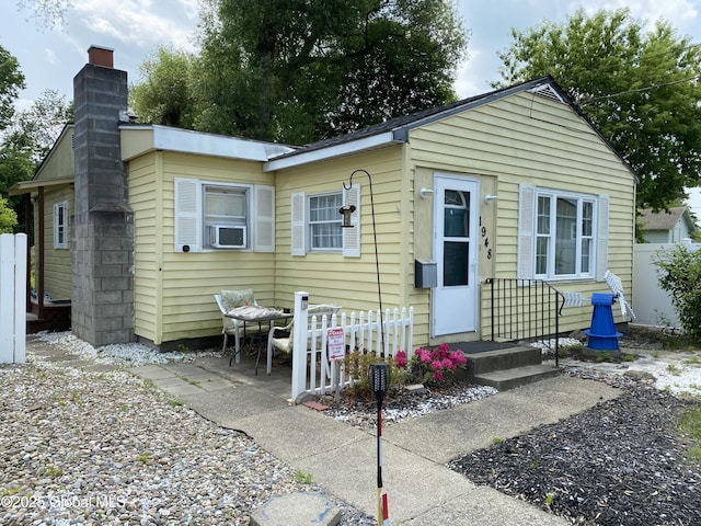 1948 Leo Ave, Rotterdam, NY 12306 - view of front of property with a chimney and cooling unit