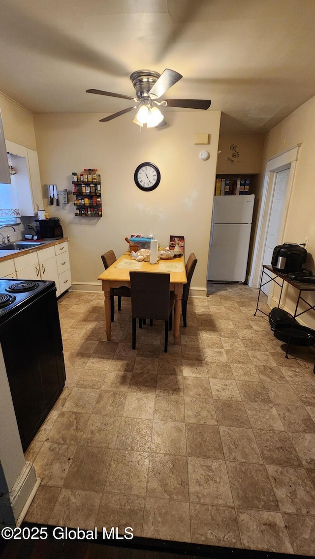 359 2nd Ave, Albany, NY 12209 - dining space with ceiling fan and baseboards