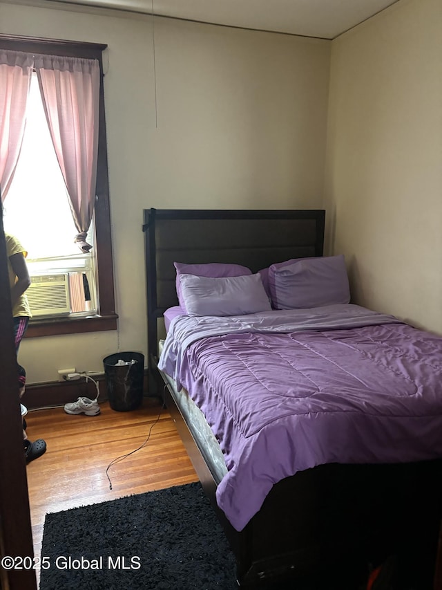 359 2nd Ave, Albany, NY 12209 - bedroom featuring wood finished floors and cooling unit