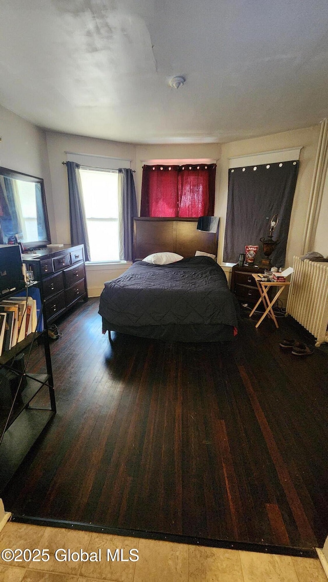359 2nd Ave, Albany, NY 12209 - bedroom with radiator heating unit and wood finished floors