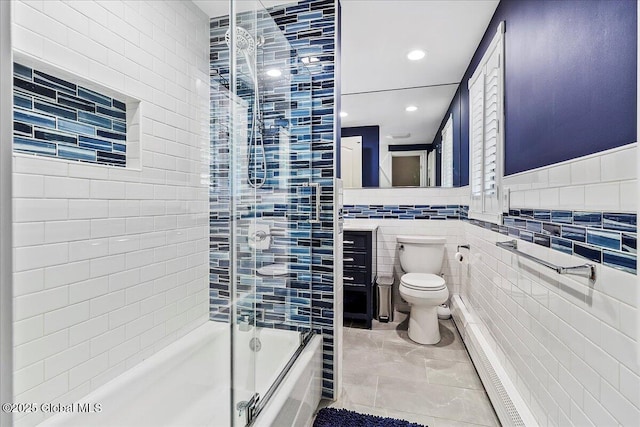 17 Cypress Pt, Clifton Park, NY 12065 - bathroom featuring bath / shower combo with glass door, tile walls, recessed lighting, and vanity
