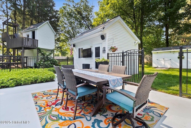 17 Cypress Pt, Clifton Park, NY 12065 - view of patio featuring outdoor dining space and a shed