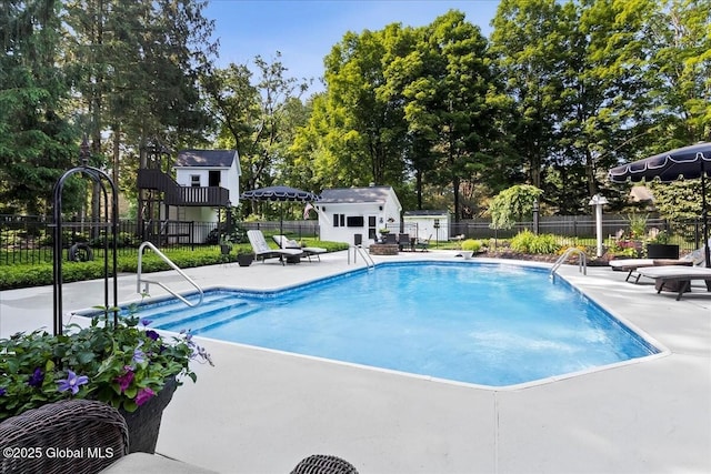 17 Cypress Pt, Clifton Park, NY 12065 - view of pool featuring a patio, an outbuilding, and view of wooded area