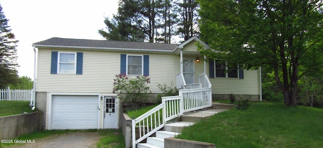 8 Cloverleaf Dr, Warrensburg, NY 12885 - view of front of home with an attached garage and dirt driveway