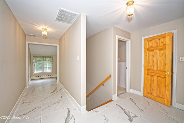 805 Karenwald Ln, Schenectady, NY 12309 - hallway featuring an upstairs landing, light marble finish flooring, and a baseboard heating unit