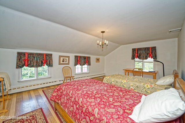 805 Karenwald Ln, Schenectady, NY 12309 - bedroom with multiple windows, hardwood / wood-style floors, lofted ceiling, and a chandelier