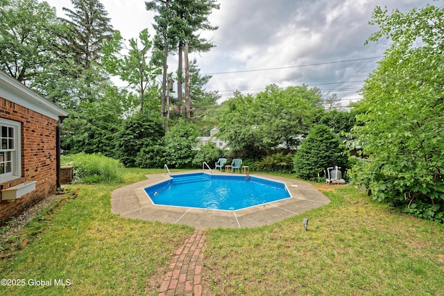 805 Karenwald Ln, Schenectady, NY 12309 - swimming pool featuring a lawn