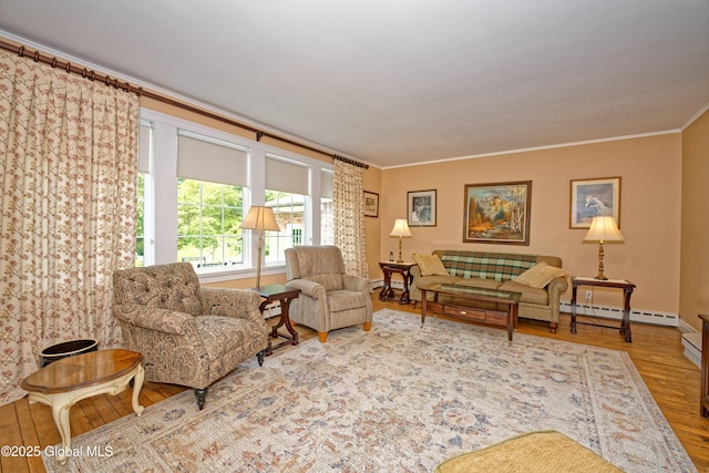 805 Karenwald Ln, Schenectady, NY 12309 - living area with wood finished floors, baseboard heating, and ornamental molding
