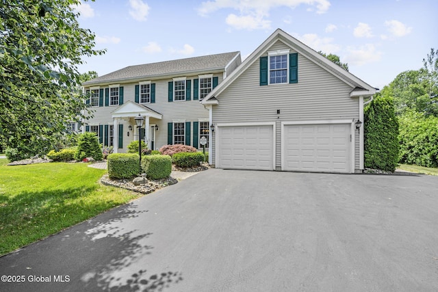 41 Jean Pl, Guilderland, NY 12303 - colonial home featuring driveway, a front yard, and an attached garage