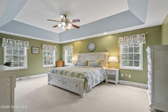 41 Jean Pl, Guilderland, NY 12303 - carpeted bedroom featuring a tray ceiling and a ceiling fan