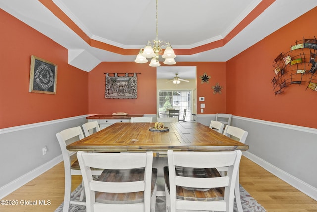 41 Jean Pl, Guilderland, NY 12303 - dining space featuring a chandelier, light wood finished floors, ceiling fan, a tray ceiling, and crown molding