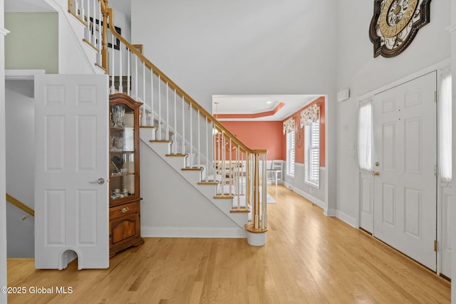41 Jean Pl, Guilderland, NY 12303 - entrance foyer featuring wood finished floors, stairs, and a high ceiling
