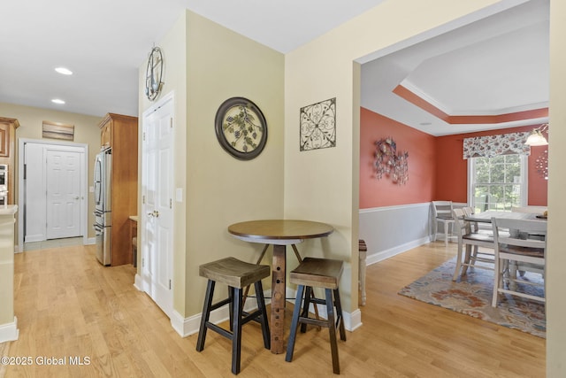 41 Jean Pl, Guilderland, NY 12303 - dining room featuring light wood-style floors, a tray ceiling, and recessed lighting