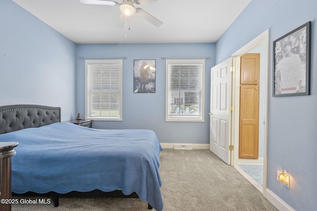 41 Jean Pl, Guilderland, NY 12303 - carpeted bedroom featuring baseboards and a ceiling fan