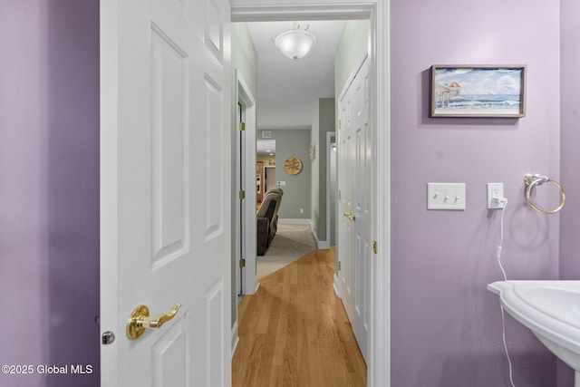 41 Jean Pl, Guilderland, NY 12303 - bathroom featuring wood finished floors and a sink