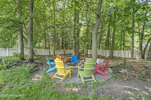 41 Jean Pl, Guilderland, NY 12303 - fenced backyard with an outdoor fire pit